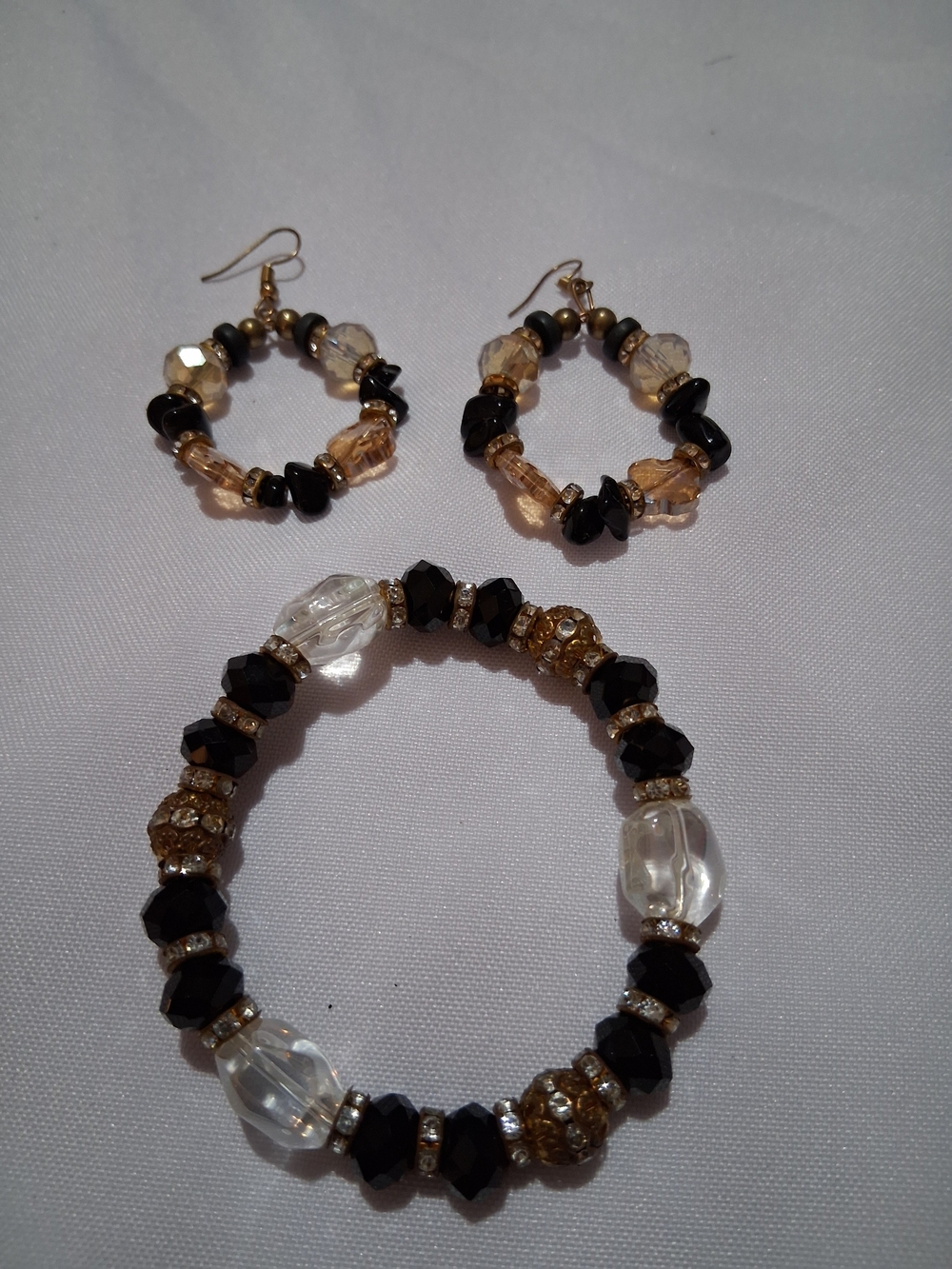 Gold and Black Beaded Bracelet with Clear Accents